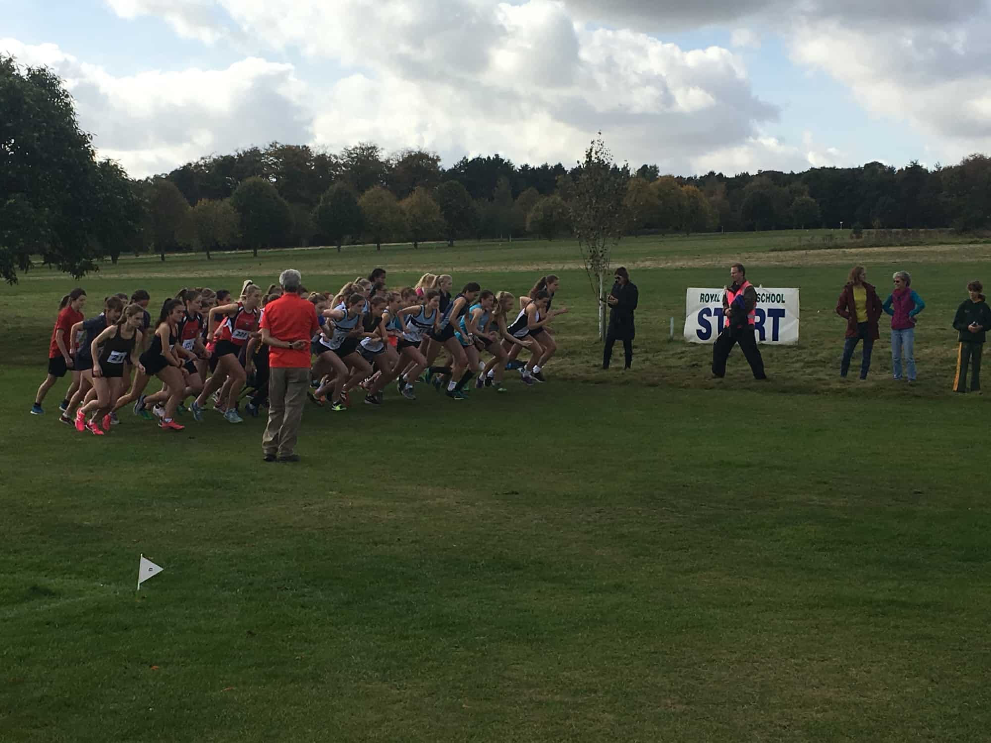 Group of athletes at the start line of the cross-country event