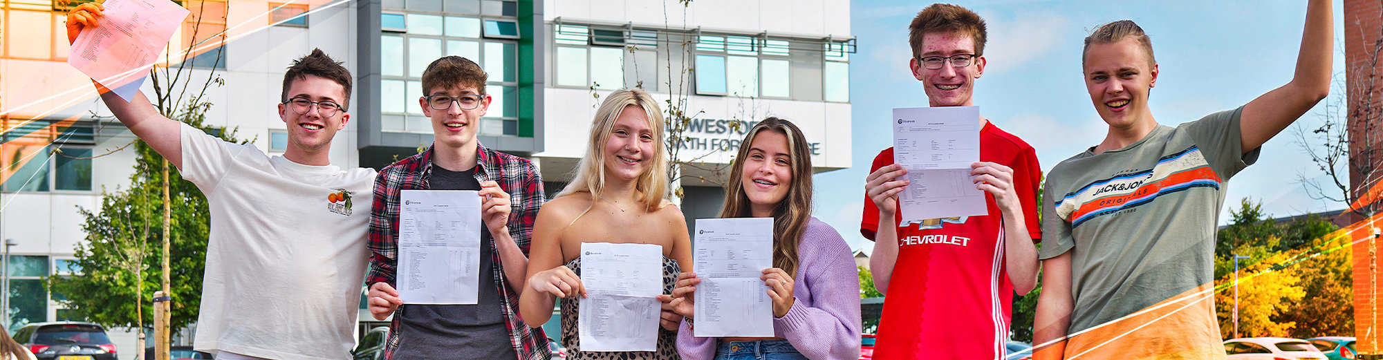 A group of students outside the college holding their exam certificates
